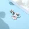 Silver pendant necklace featuring a mother and daughter heart charm on a light blue background