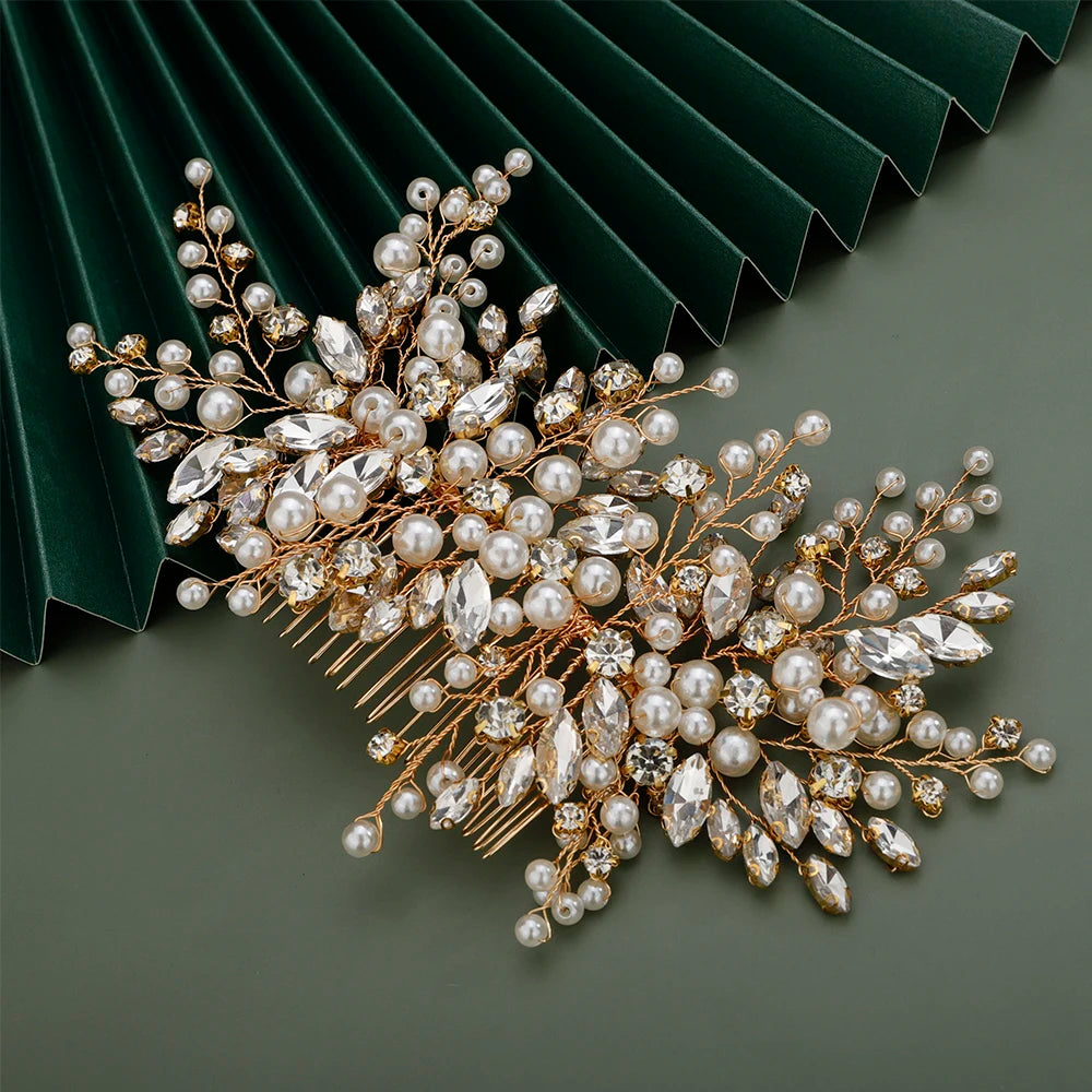 A delicate bridal headpiece featuring gold-toned wires adorned with pearls and clear rhinestones.