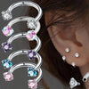 Stainless steel crystal hoop ear piercings featuring various colored and clear stones.