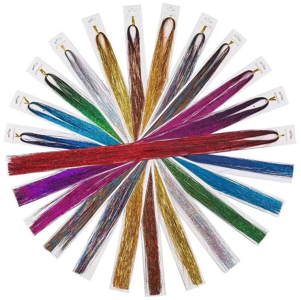 A collection of twelve strands of synthetic hair tinsel in various colors radiating outwards.