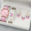 A pink fashion quartz wristwatch with a leather strap and several butterfly-shaped gold necklaces is displayed in an open box