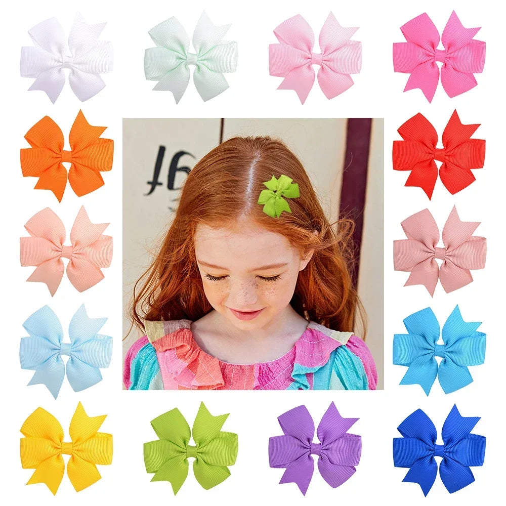 Assorted grosgrain ribbon hair bows in various colors and sizes for girls