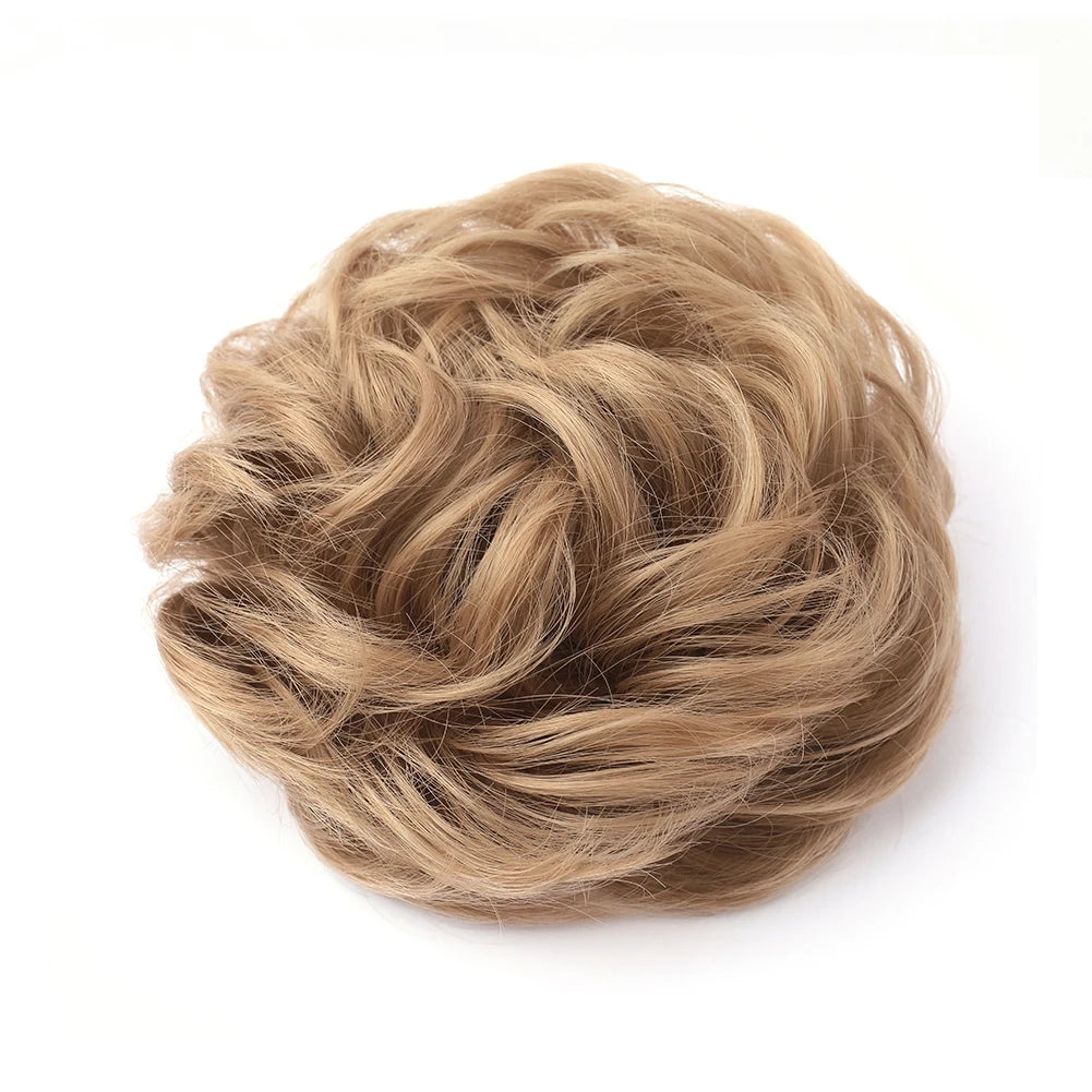 A bundle of light brown, wispy hair used for a messy bun or curly updo.