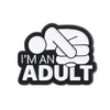 Black and white enamel lapel pin featuring a stylized fist and the text I'm an adult