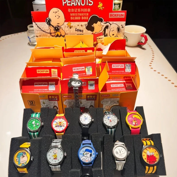 A collection of Snoopy Kawaii cartoon blind box watches and boxes displayed on a white surface.