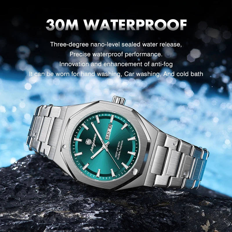 A stainless steel watch with a teal face and silver band is shown resting on a dark rock.
