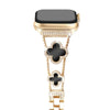Montre connectée ton gold avec cadran noir et bracelet universel scintillant.
