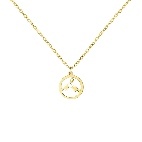 A delicate gold-plated stainless steel mountain silhouette necklace on a gold chain.