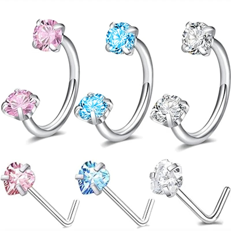 A set of silver horseshoe nose rings featuring pink, blue, and clear diamond-cut gemstone designs.
