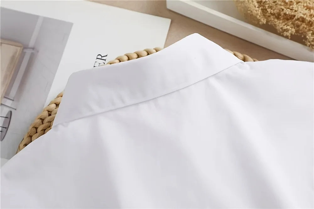 Close-up of a white elegant detachable button-up collar shirt fabric
