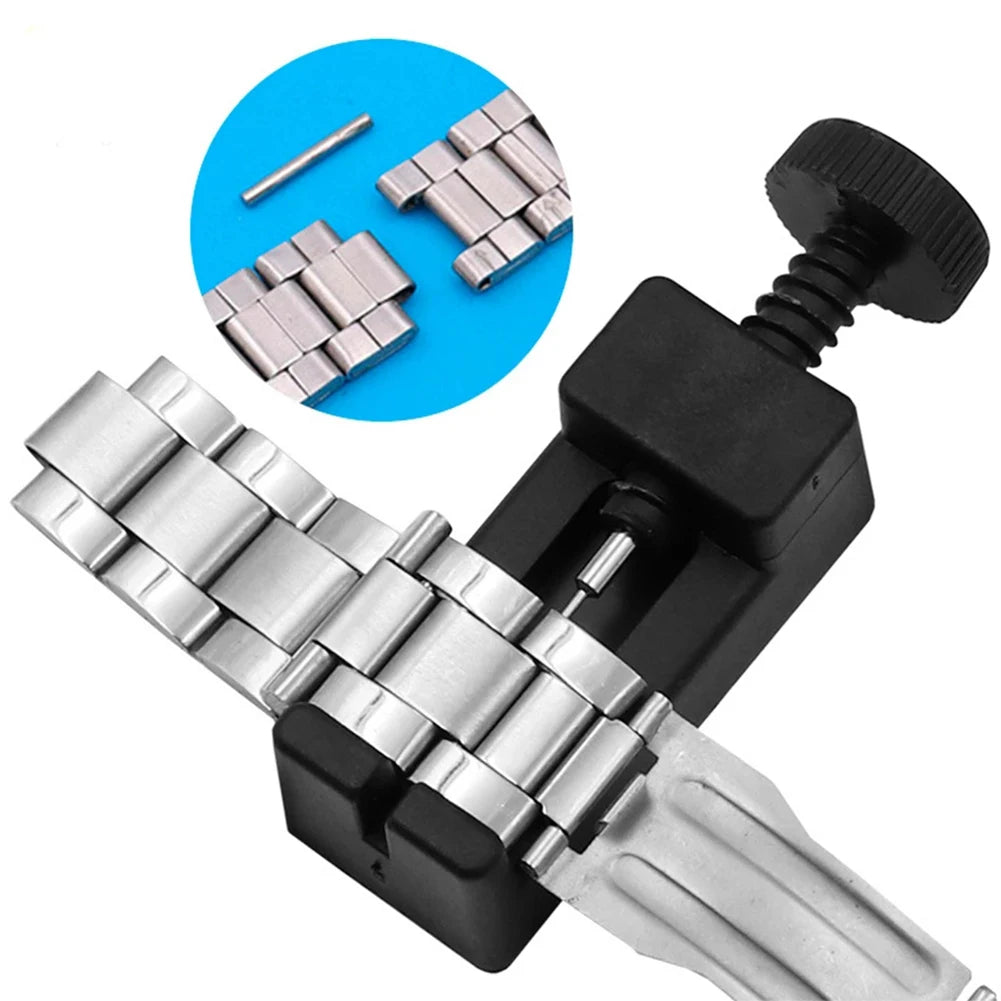 A precision watch band link pin remover tool shown with a disassembled link and a black tool handle.