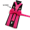 A set of pink polyester suspenders with bow ties displayed against a black background.