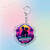 Silver pendant keychain featuring a silhouette of two figures against a sunset tropical background with the text MIDNIGHT HEI