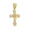 Pendentif de croix doré orné de petits diamants.