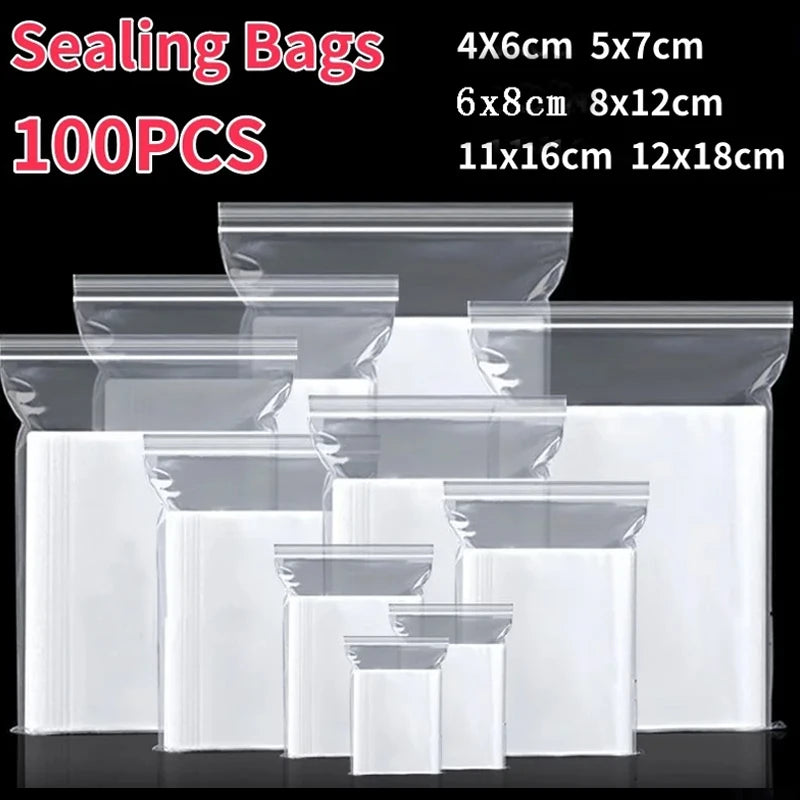A collection of clear reusable zip lock sealing bags in various sizes and dimensions.