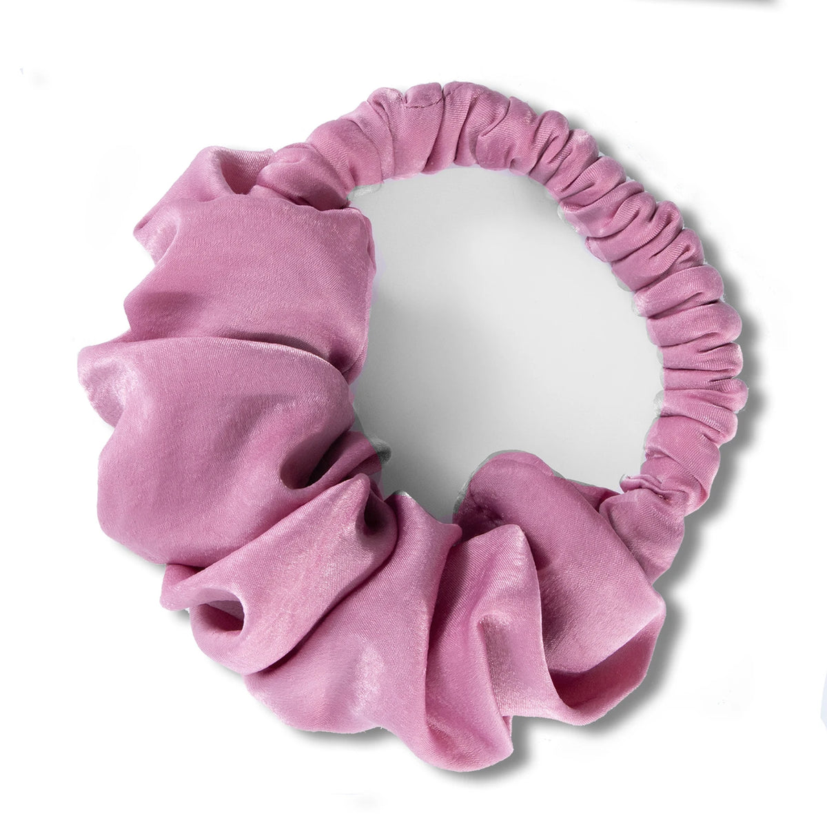 A pink satin heatless hair curling scrunchie with ruffled edges.
