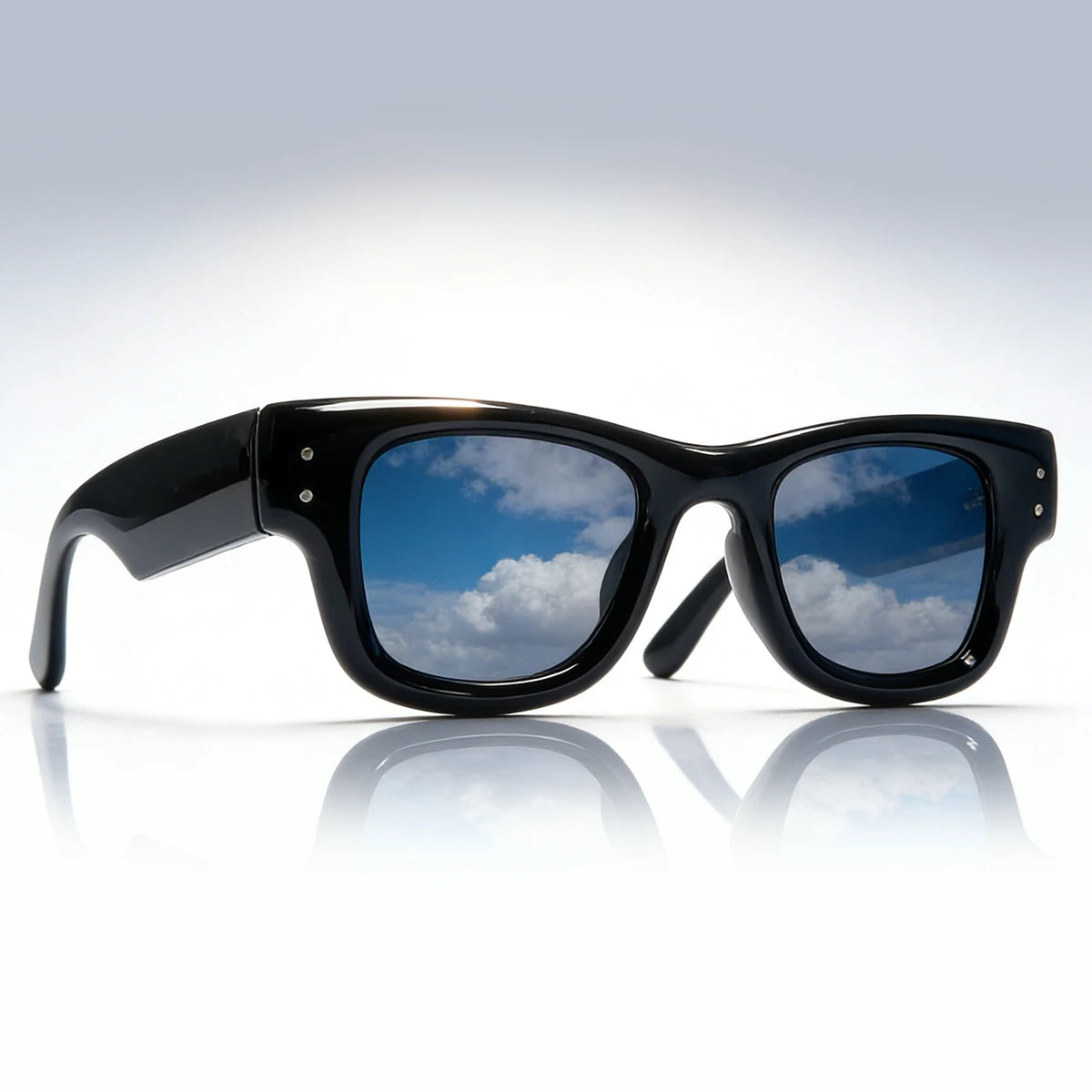 Black classic puffer square sunglasses with blue sky and white clouds reflection