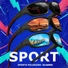 A set of black polarized sports sunglasses with red accents displayed against a vibrant blue and pink background.