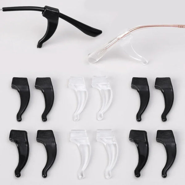 A collection of black silicone anti-slip ear hooks for eyeglasses, shown in various shapes and angles.