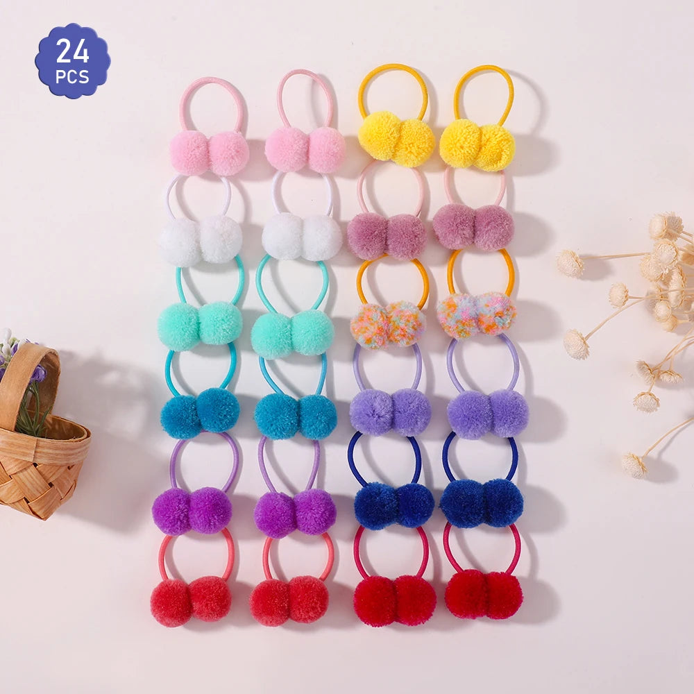 A set of 24 colorful double plush elastic hair bands in pink, yellow, and blue for girls.