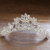 A sparkling crystal princess tiara hair comb for women with floral designs.