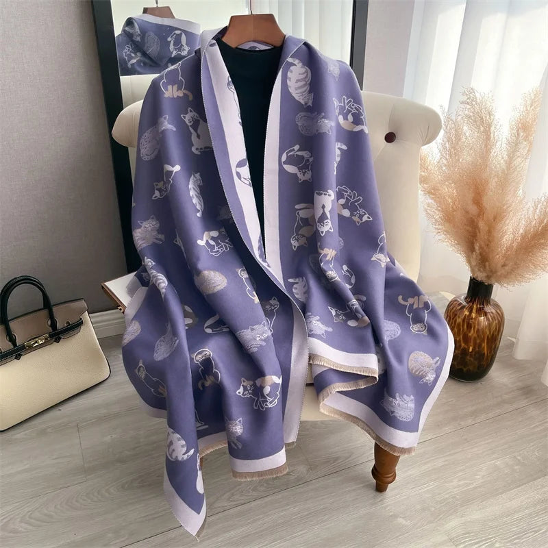 A purple and white plaid cashmere feel scarf and shawl wrap draped over a hanger.