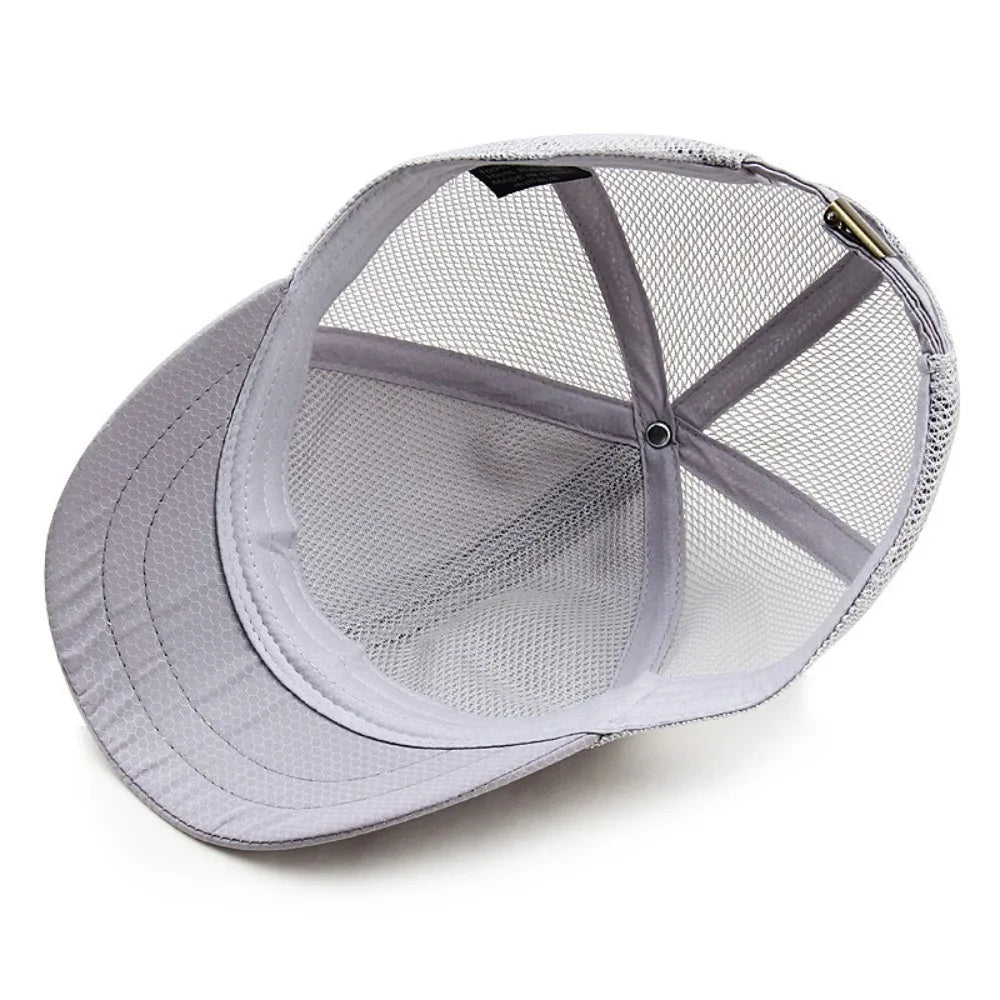 A light gray mesh sun visor cap with a ventilated design shown from above.