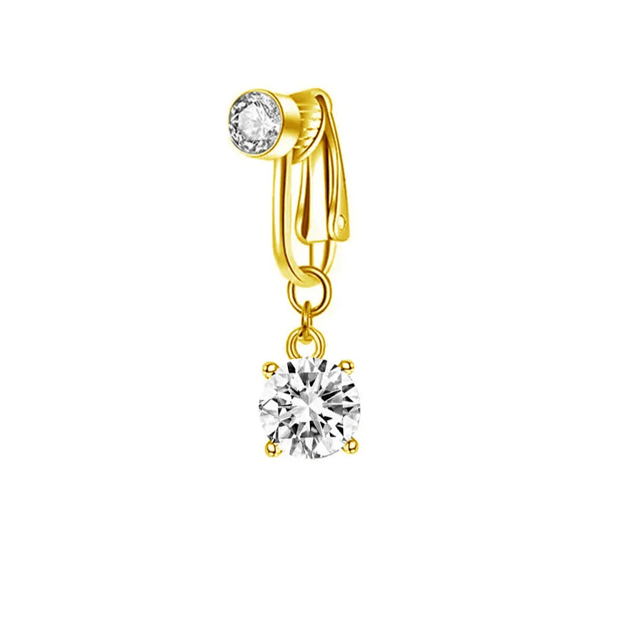 A gold-colored fashion belly button ring with a clear diamond-like stone and a bail.