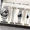 A gift box display showing a silver chronograph watch, a silver chain, and a silver wristwatch inside.