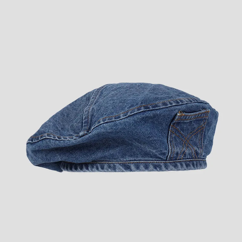 A dark blue retro washed cotton denim beret hat with a folded brim.