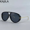 Gafas piloto vintage negras y grandes con brazos dorados