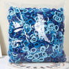A pile of blue and purple nylon elastic hair cords for kids headbands packaged in clear plastic.