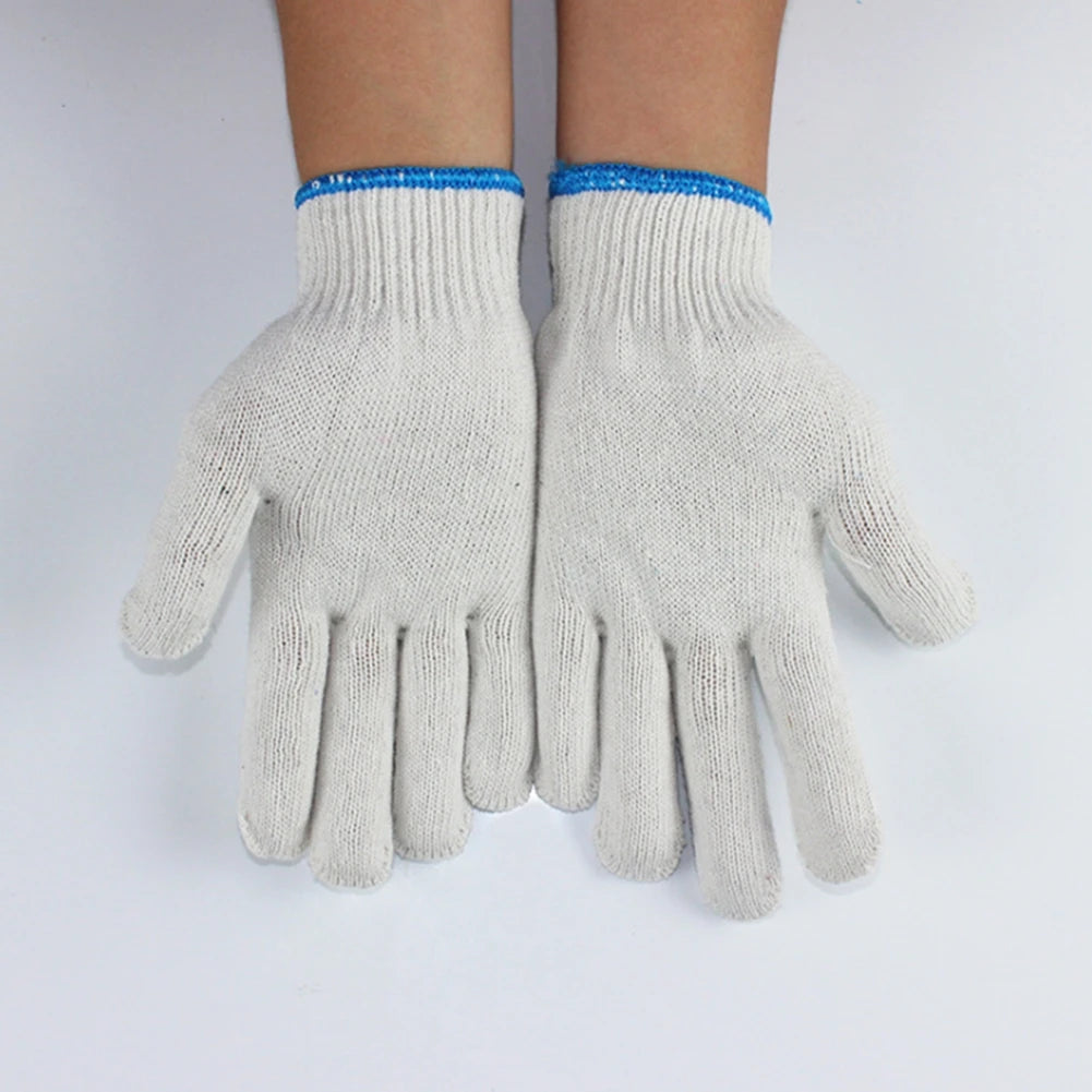 Light gray knitted thread work gloves with blue trim shown on a person's hand.
