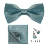 A teal striped bow tie and cufflink set displayed against a white background.