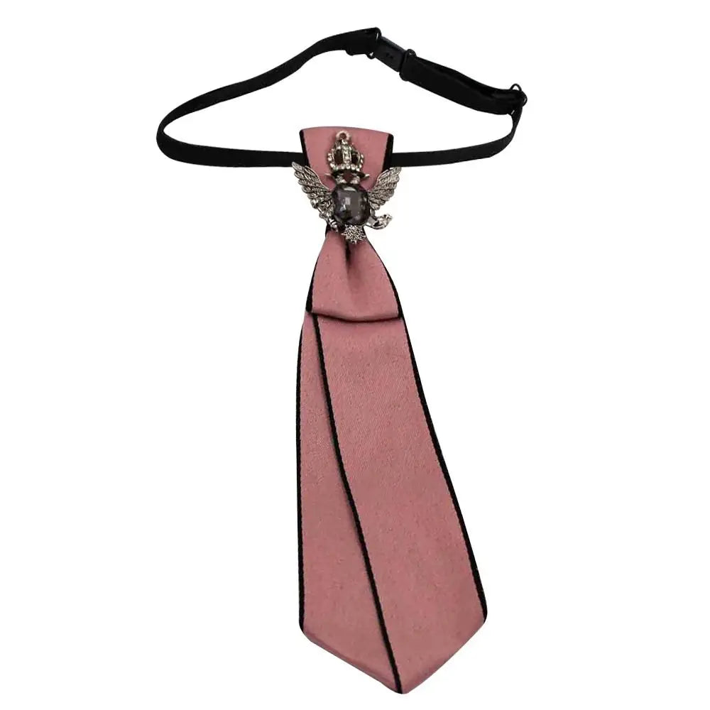 A pink satin bow tie with a silver crystal rhinestone clasp and black necktie ribbon.
