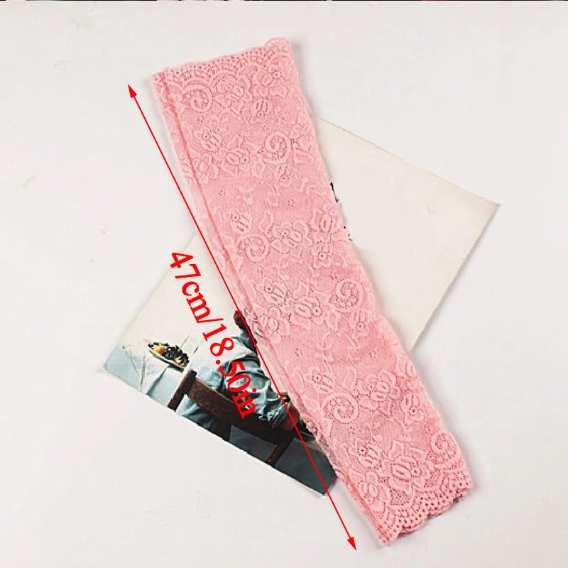 Pink lace anti-sunburn arm sleeves displayed on a white background with measurement lines.