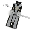 A set of gray adjustable polyester suspenders and bow ties displayed on a black card.