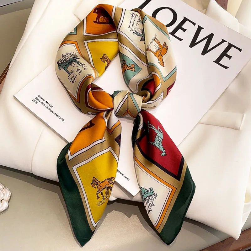 A set of fashion silk scarves and a headband featuring geometric patterns in yellow, orange, and green tones.