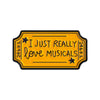 Yellow enamel pin with black border featuring the text I just really love musicals and a star design