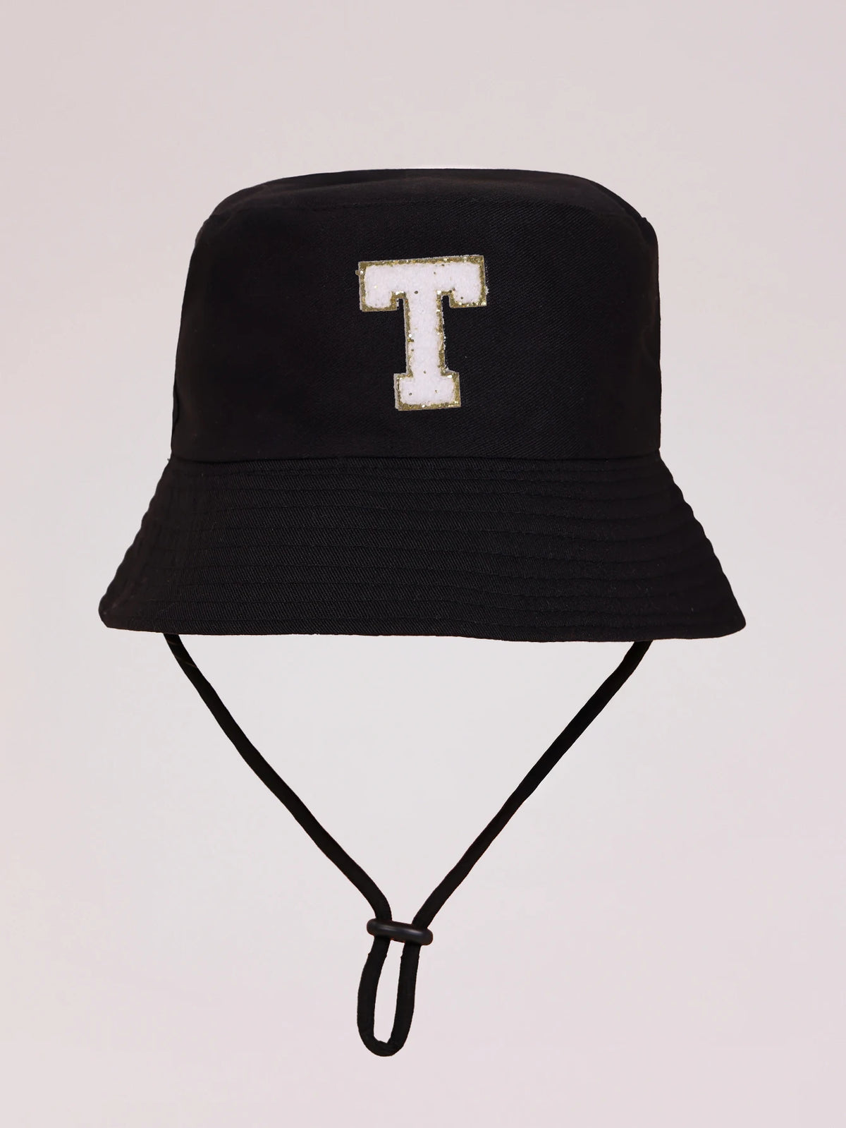 Black sun hat with a white letter T embroidered on the front and an adjustable cord.