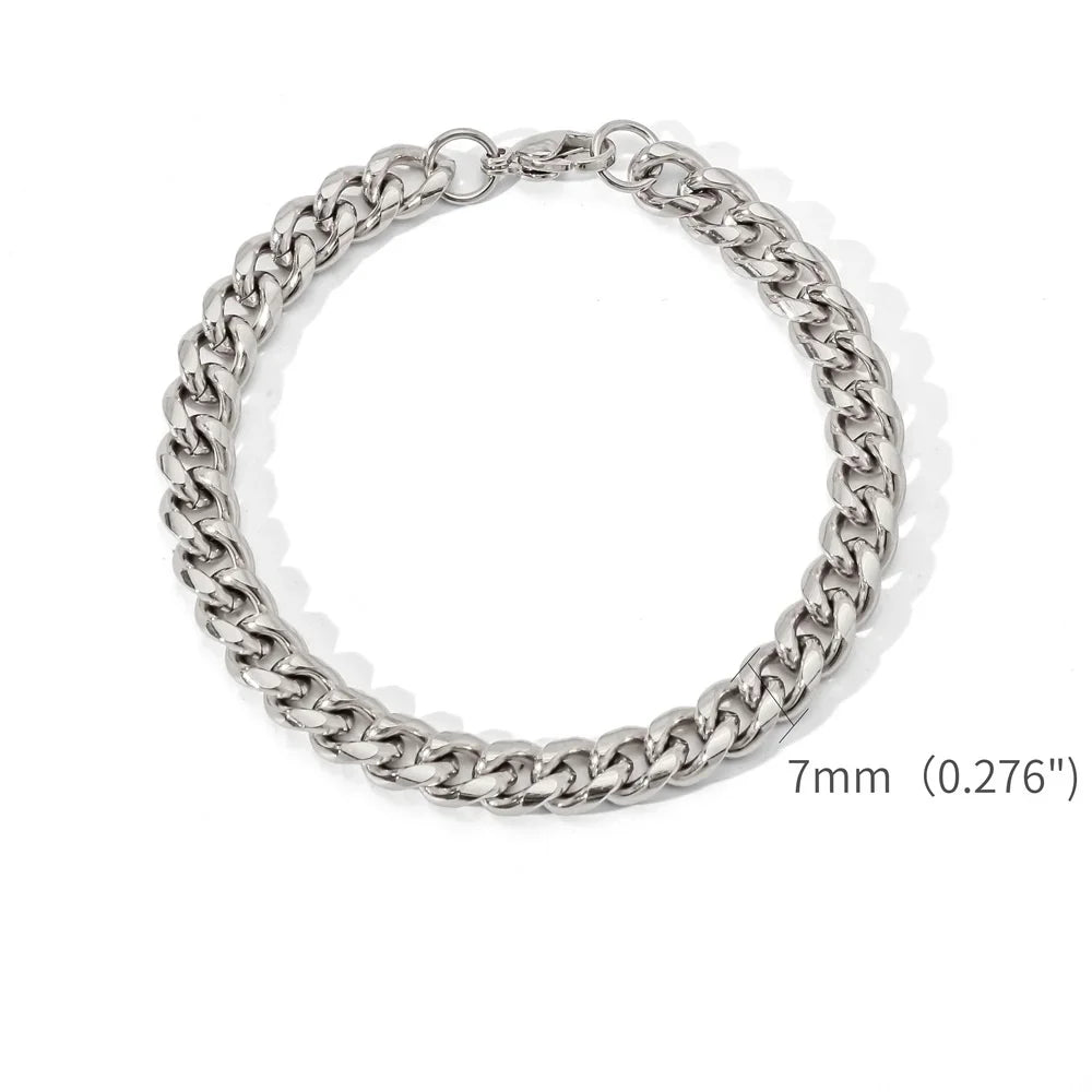 A silver stainless steel Cuban link bracelet displayed on a white background.