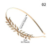 Gold leaf headband for bridal or party decoration, featuring delicate floral accents.
