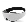 A grey and black contoured sleep mask designed for deep rest.