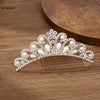A sparkling crystal princess tiara hair comb for women featuring pearls and clear crystals.