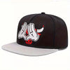 Black adjustable snapback cap featuring a white graphic of a skull and crossed hands.