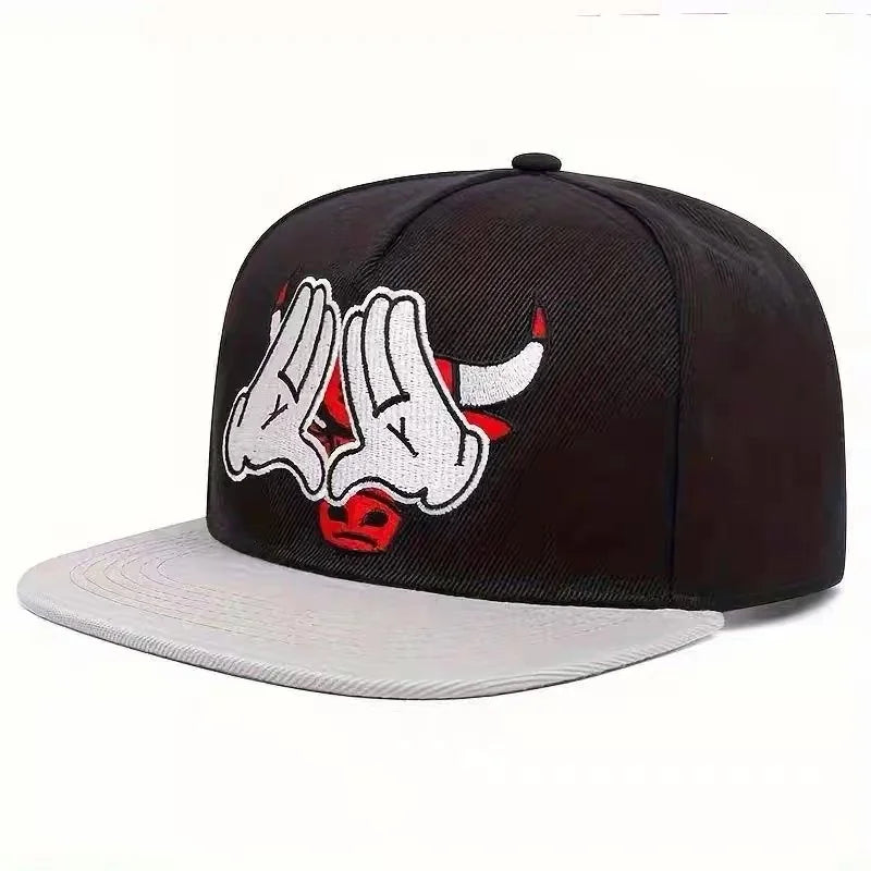 Black adjustable snapback cap featuring a white graphic of a skull and crossed hands.