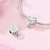 Sterling silver devil's eye charm bracelet featuring a charm with a cat and small hearts