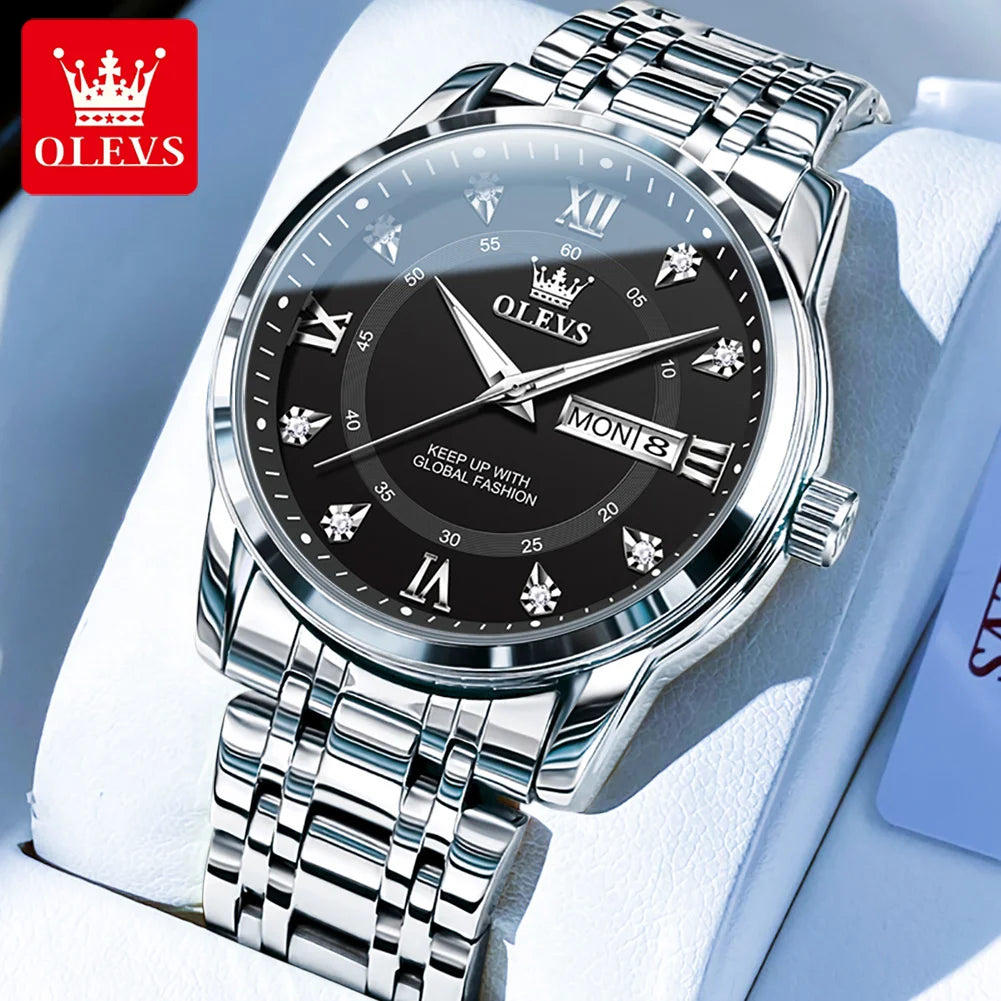 A stainless steel watch with a black dial and silver hands is displayed on a white background.