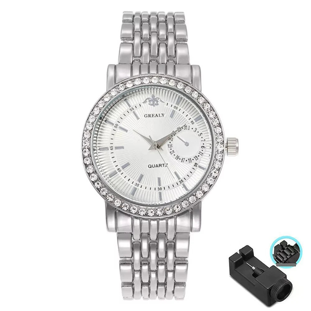 Silver quartz wristwatch with a metal link bracelet and a crystal face.