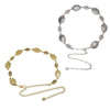 Cadena de cintura ovalada de metal dorado vintage para mujeres con intrincados eslabones y elementos decorativos.